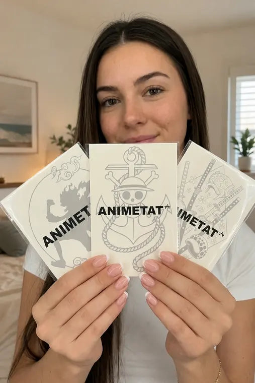 Customer holding multiple ANIMETAT tattoo packs